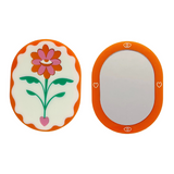 Stof Studios Eden pocket mirror with multi-color design, compact and stylish accessory for on-the-go reflection.