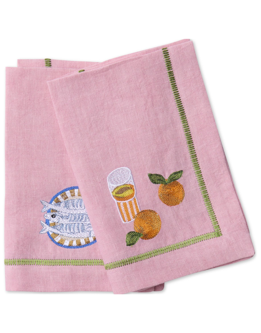 Kip & Co Supper Club embroidered linen napkin set with colorful floral embroidery on four elegant cloth napkins.