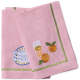 Kip & Co Supper Club embroidered linen napkin set with colorful floral embroidery on four elegant cloth napkins.