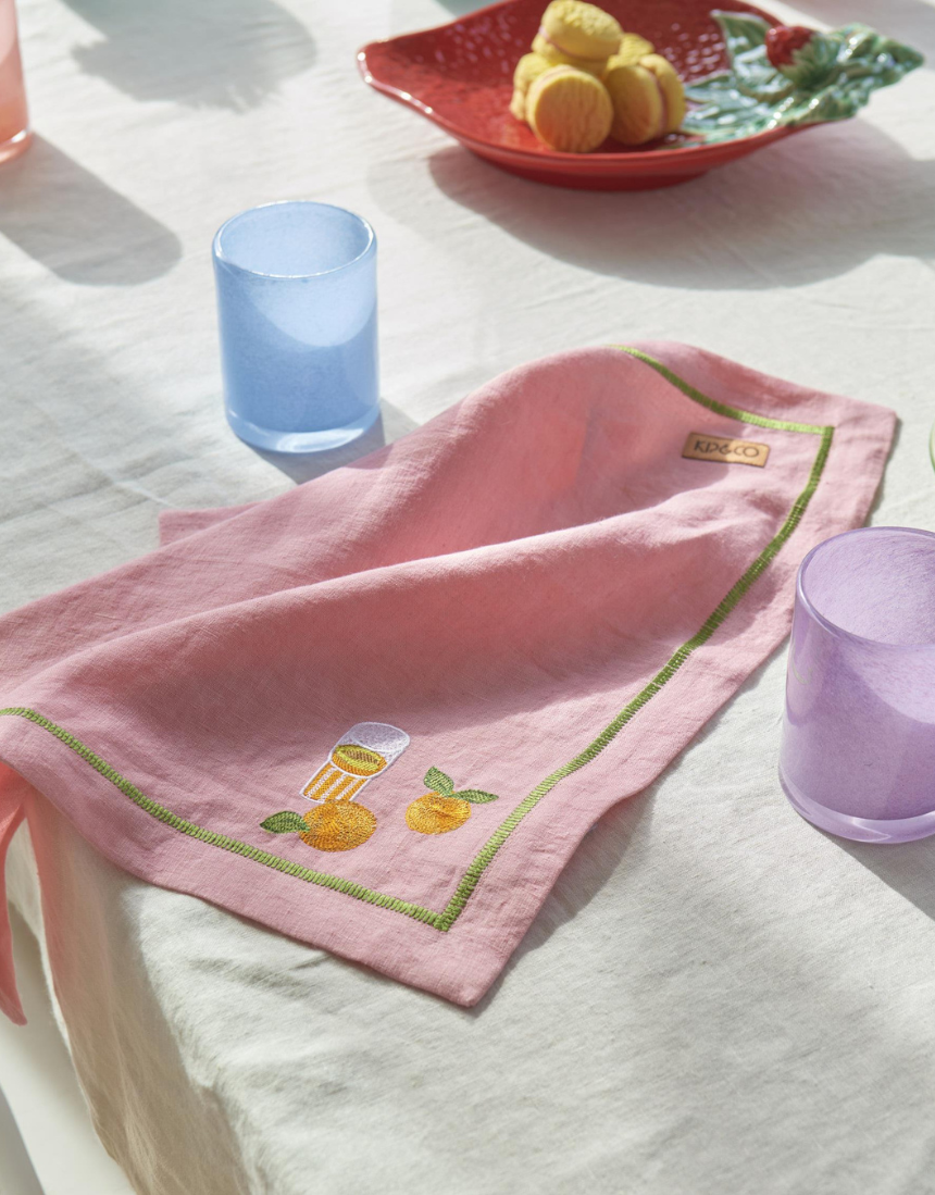 Kip & Co Supper Club embroidered linen 4-piece napkin set with colorful embroidered design on soft linen fabric.
