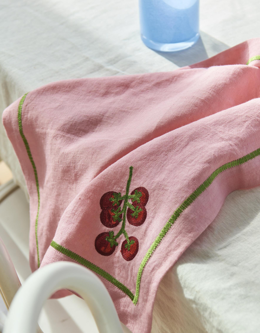 Kip & Co embroidered linen 4-piece napkin set with colorful supper club design on soft, stylish fabric.