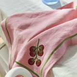 Kip & Co embroidered linen 4-piece napkin set with colorful supper club design on soft, stylish fabric.