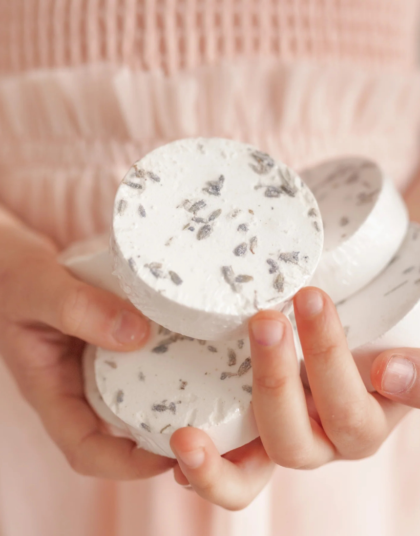 Mindful and Co Kids sensory shower steamers in colorful packaging, designed for calming and sensory relaxation.