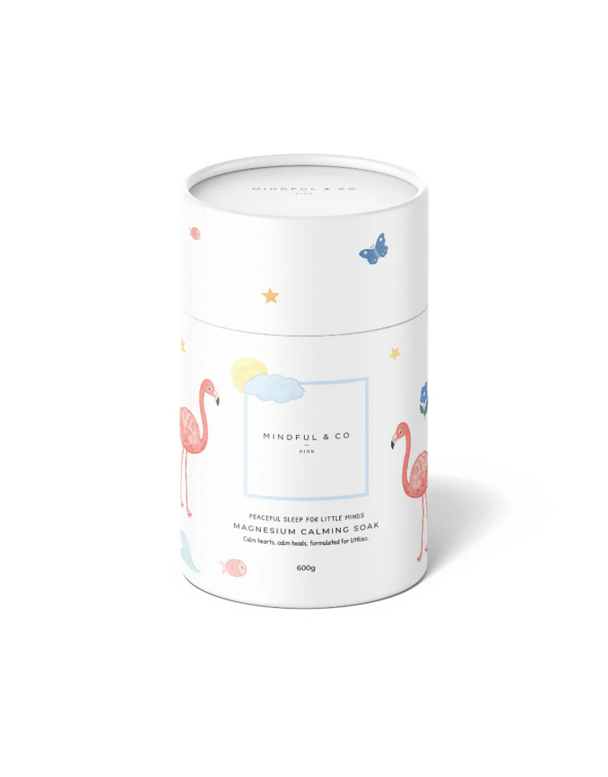 Kids magnesium calming soak by Mindful and Co Kids in a clear bath additive bottle with calming labels.