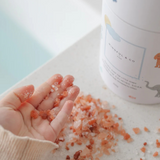 Kids magnesium calming soak bath additive from Mindful and Co Kids, showing a bottle of relaxing bath product for children.