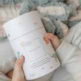 Kids magnesium calming soak bath additive from Mindful and Co Kids, showing a colorful bottle with soothing bath salts inside.