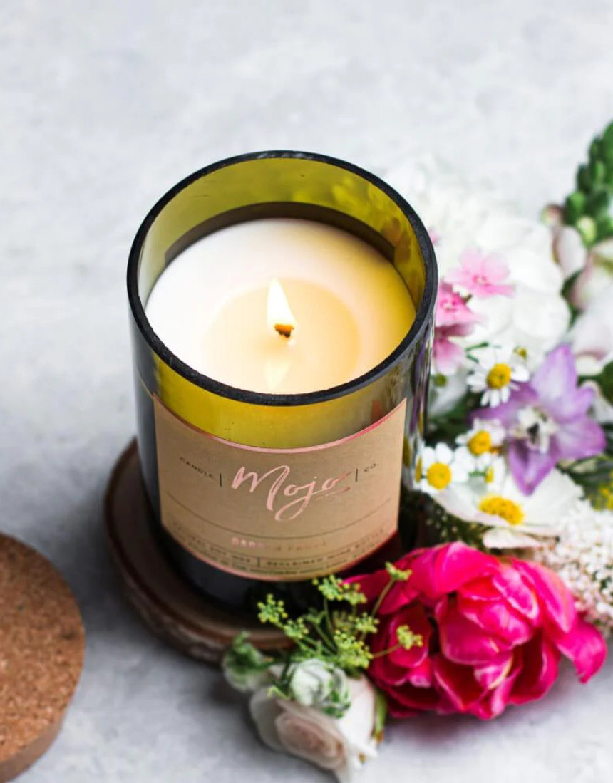 Mojo Candle Co. Garden Party candle with floral design in a glass jar, perfect for home decor and relaxing ambiance.