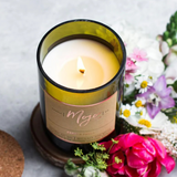 Mojo Candle Co. Garden Party candle with floral design in a glass jar, perfect for home decor and relaxing ambiance.
