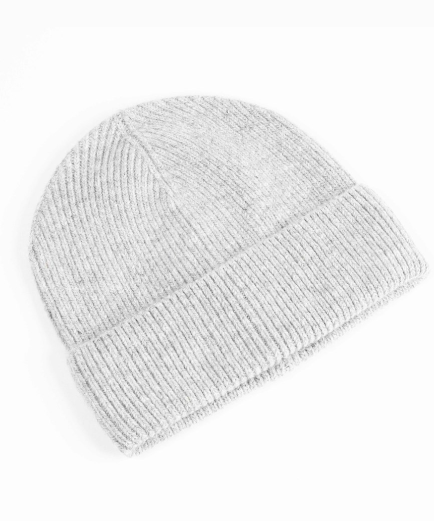 Maison Fanli Auguste Beanie in light grey, soft knit fabric, shown on a person, stylish winter accessory.