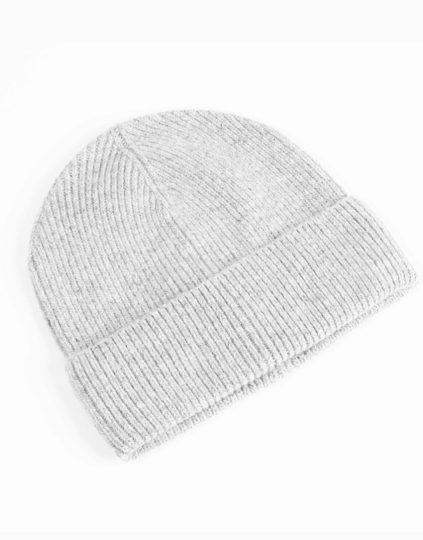 Maison Fanli Auguste Beanie in light grey, soft knit fabric, shown on a person, stylish winter accessory.