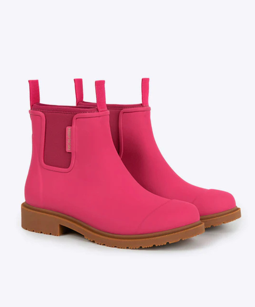 Pink Merry People Bobbi gumboots with waterproof design and sturdy soles, perfect for rainy days.