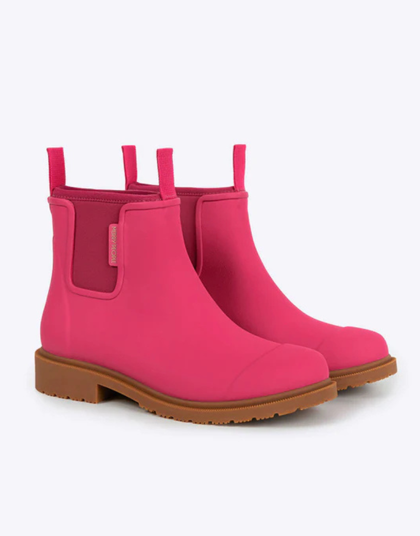 Pink Merry People Bobbi gumboots with waterproof design and sturdy soles, perfect for rainy days.
