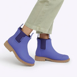 Violet and blue Merry People Bobbi gumboots with waterproof rubber soles, perfect for rainy weather and outdoor activities.