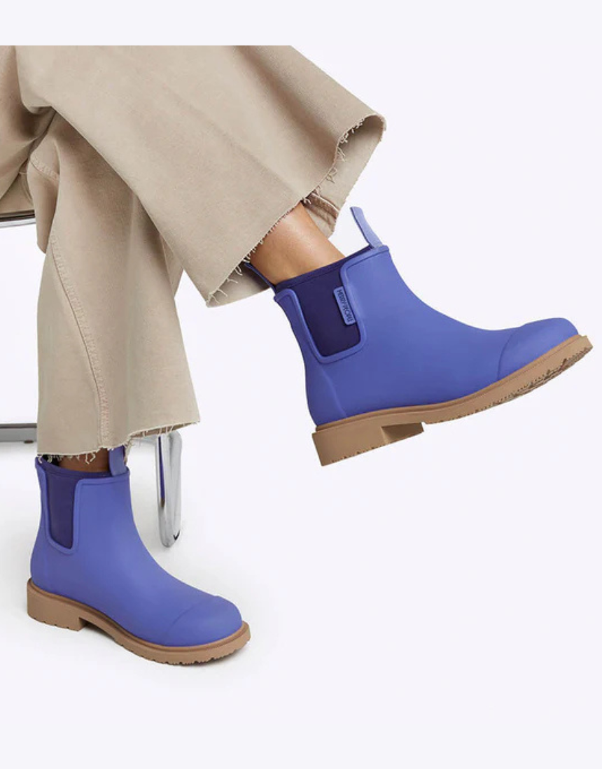 Violet and blue Merry People Bobbi gumboots with waterproof rubber material and stylish design for outdoor wear