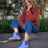 Violet and blue Merry People Bobbi gumboots with waterproof design and stylish pattern, perfect for rainy weather.