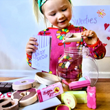 Make Me Iconic kids wooden candy jar toy set featuring colorful candy-shaped wooden pieces and a classic jar container.