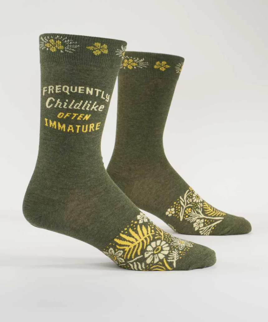 Blue Q childlike M-Crew socks featuring playful, colorful designs on soft fabric, perfect for kids or casual wear.