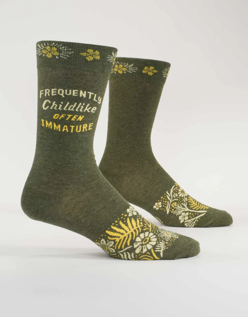 Blue Q childlike M-Crew socks featuring playful, colorful designs on soft fabric, perfect for kids or casual wear.