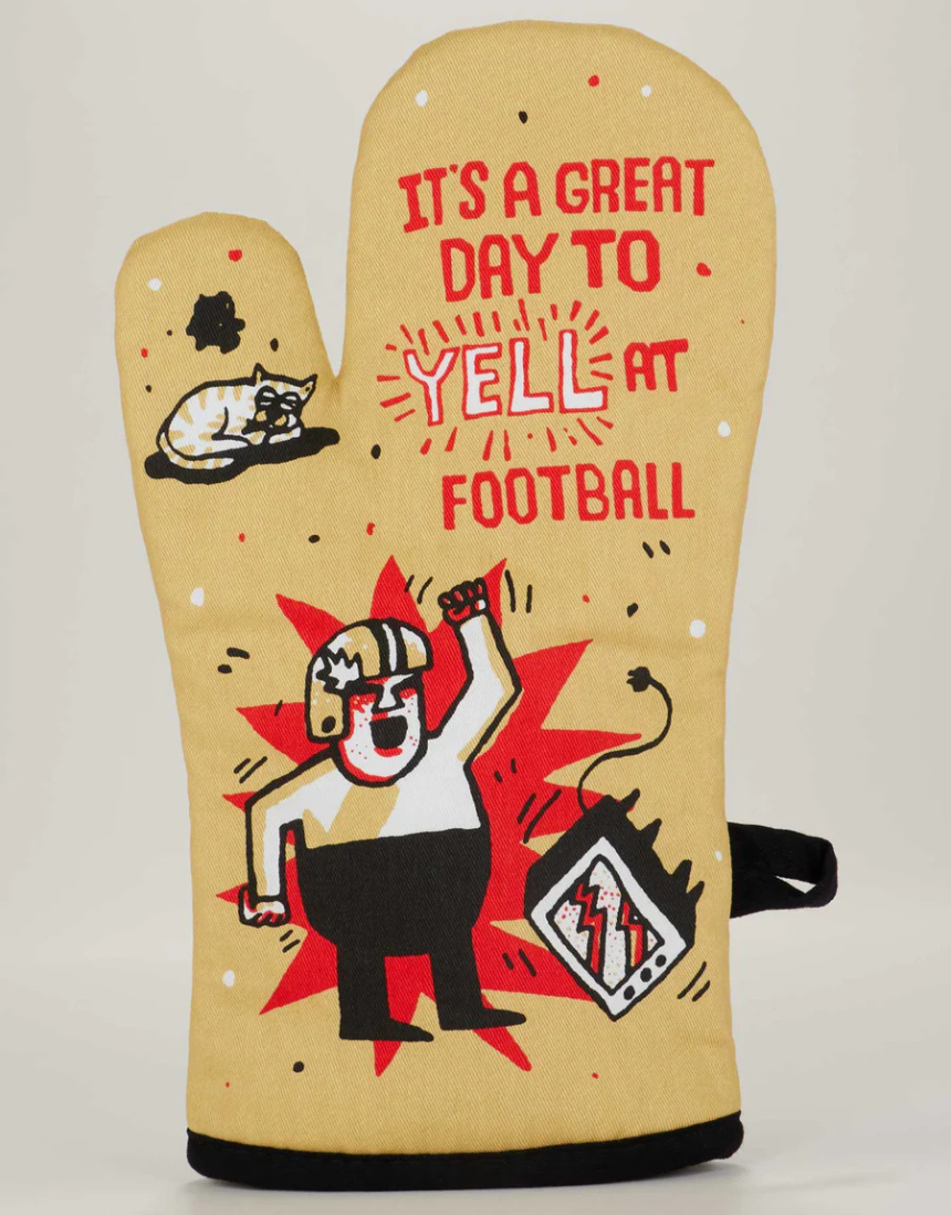 Blue Q Yell at Football oven mitt featuring a bold football graphic and vibrant blue color, designed for safe handling in the kitchen.