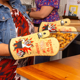 Blue Q Yell at Football oven mitt in bright blue with bold black and white football-themed design, heat-resistant kitchen accessory.