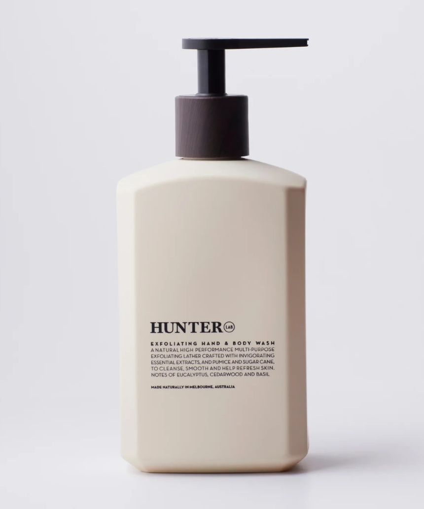 Hunter Lab exfoliating hand and body wash in 550ml bottle, featuring a sleek black design and textured surface.