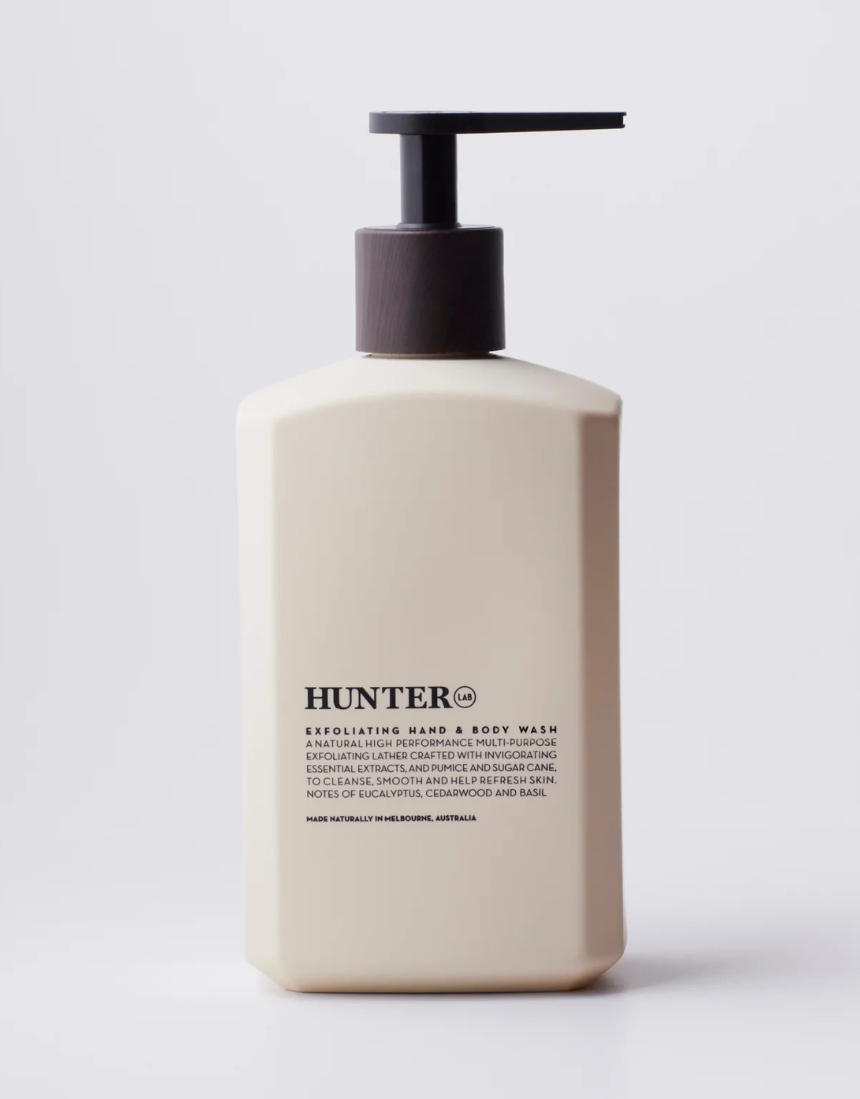 Hunter Lab exfoliating hand and body wash in 550ml bottle, featuring a sleek black design and textured surface.