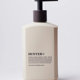 Hunter Lab exfoliating hand and body wash in 550ml bottle, featuring a sleek black design and textured surface.