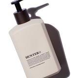 Hunter Lab exfoliating hand and body wash in 550ml bottle, featuring a sleek design for cleansing and exfoliation.
