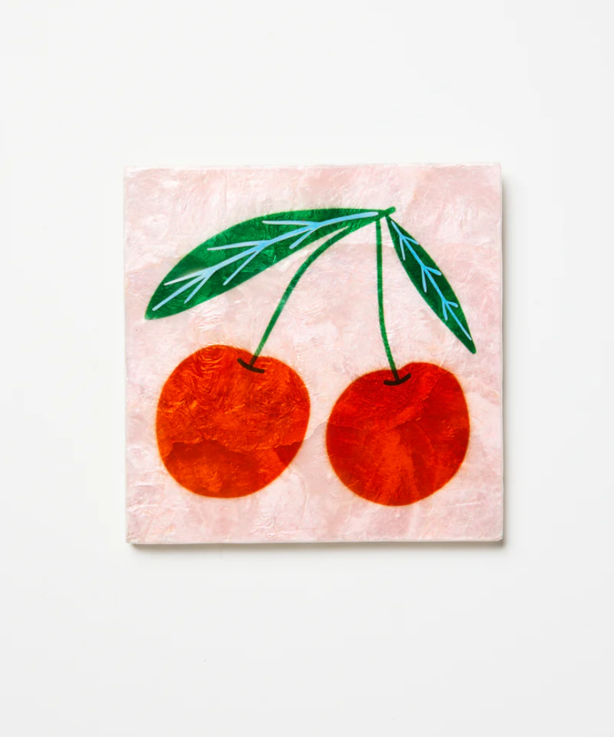 Jones & Co Superette Cherries Tile wall decor featuring a vibrant cherry pattern on ceramic tile.