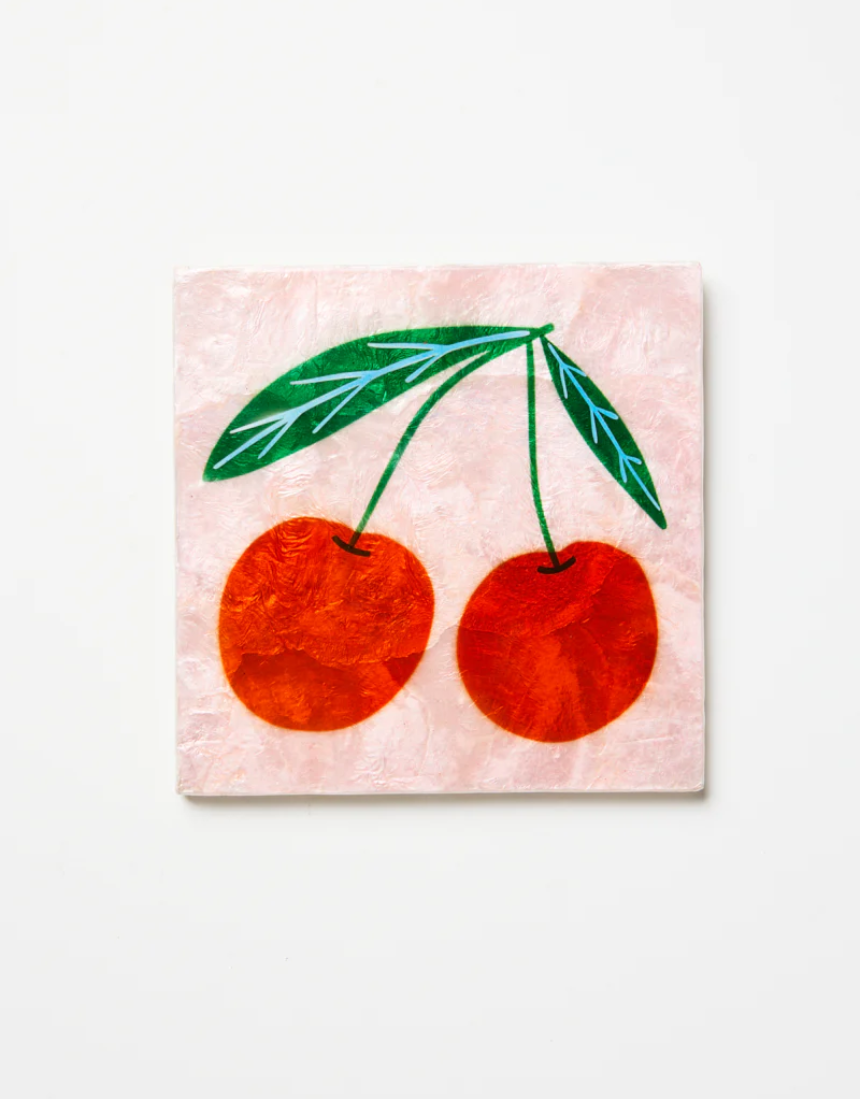 Jones & Co Superette Cherries Tile wall decor featuring a vibrant cherry pattern on ceramic tile.