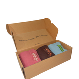 Set of three Merry People socks in colorful patterns, displayed in a box, perfect for gift-giving or everyday wear.