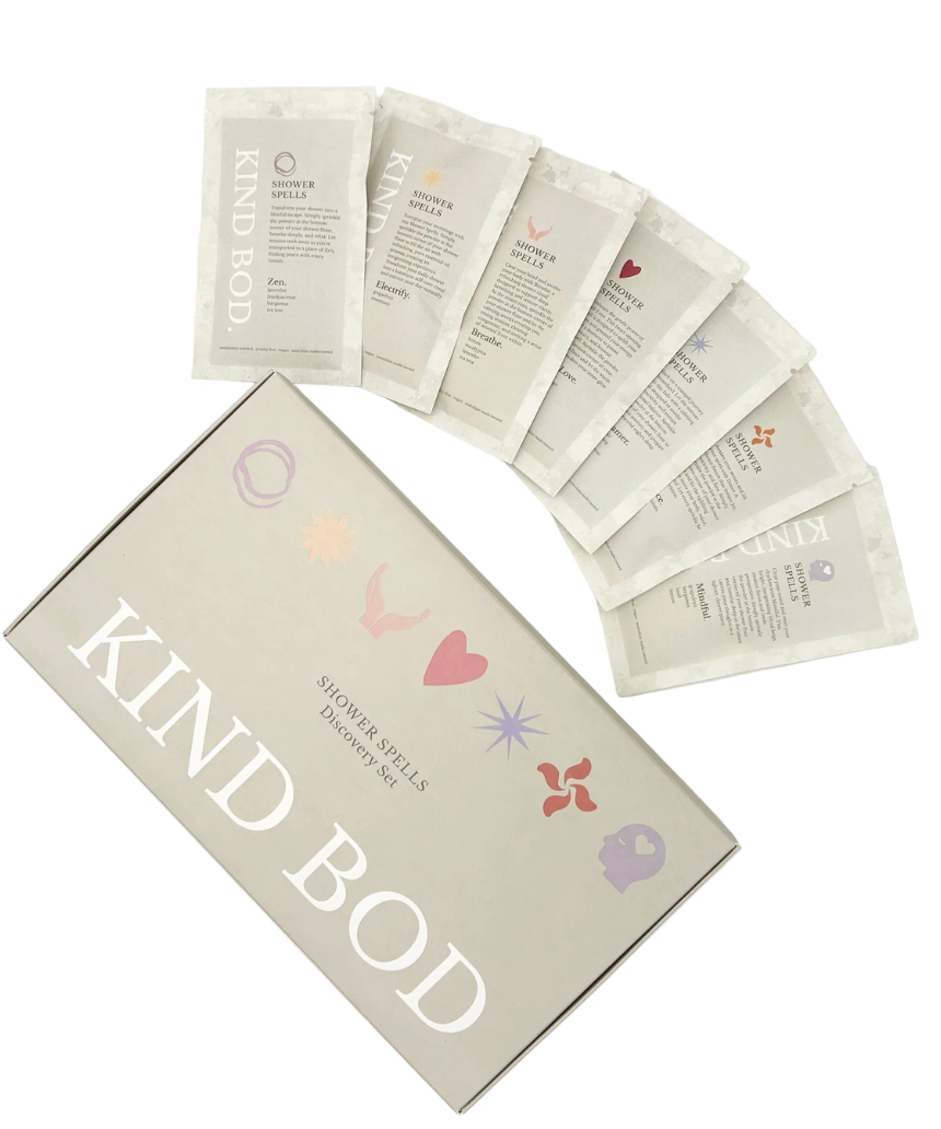 Kind Bod Shower Spell Discovery Set with colorful bath additives and natural ingredients for a relaxing shower experience.