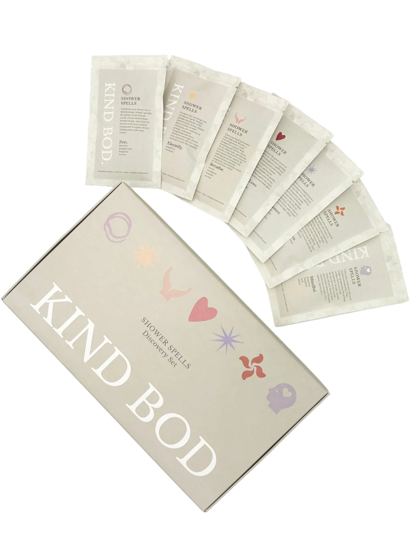 Kind Bod Shower Spell Discovery Set with colorful bath additives and natural ingredients for a relaxing shower experience.