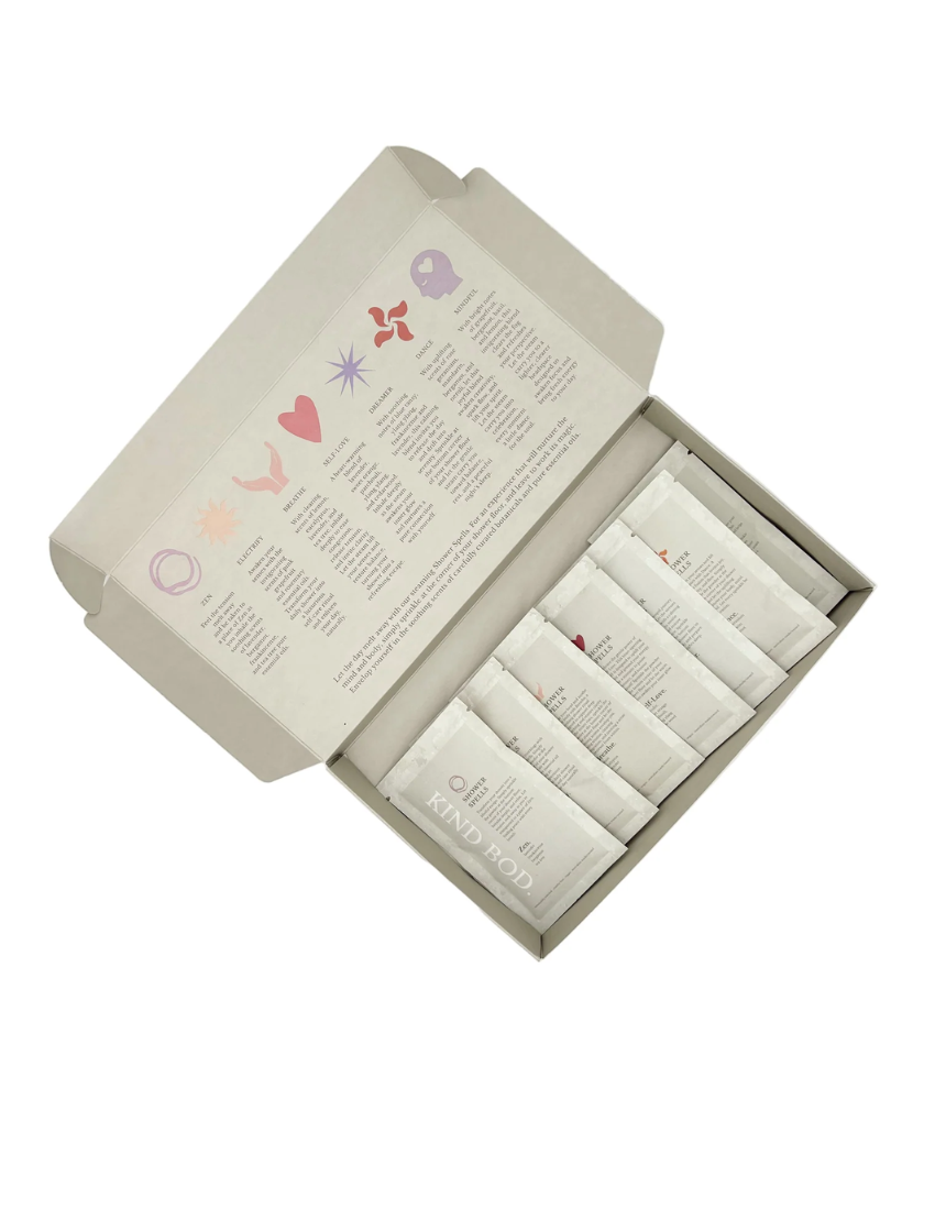 Kind Bod Shower Spell Discovery Set with colorful bath additives and natural ingredients for a relaxing shower experience.