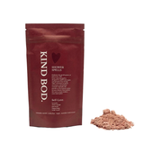 Kind Bod shower steamer from the Shower Spell Pack, designed for self-love, with vibrant colors and aromatic herbs visible.