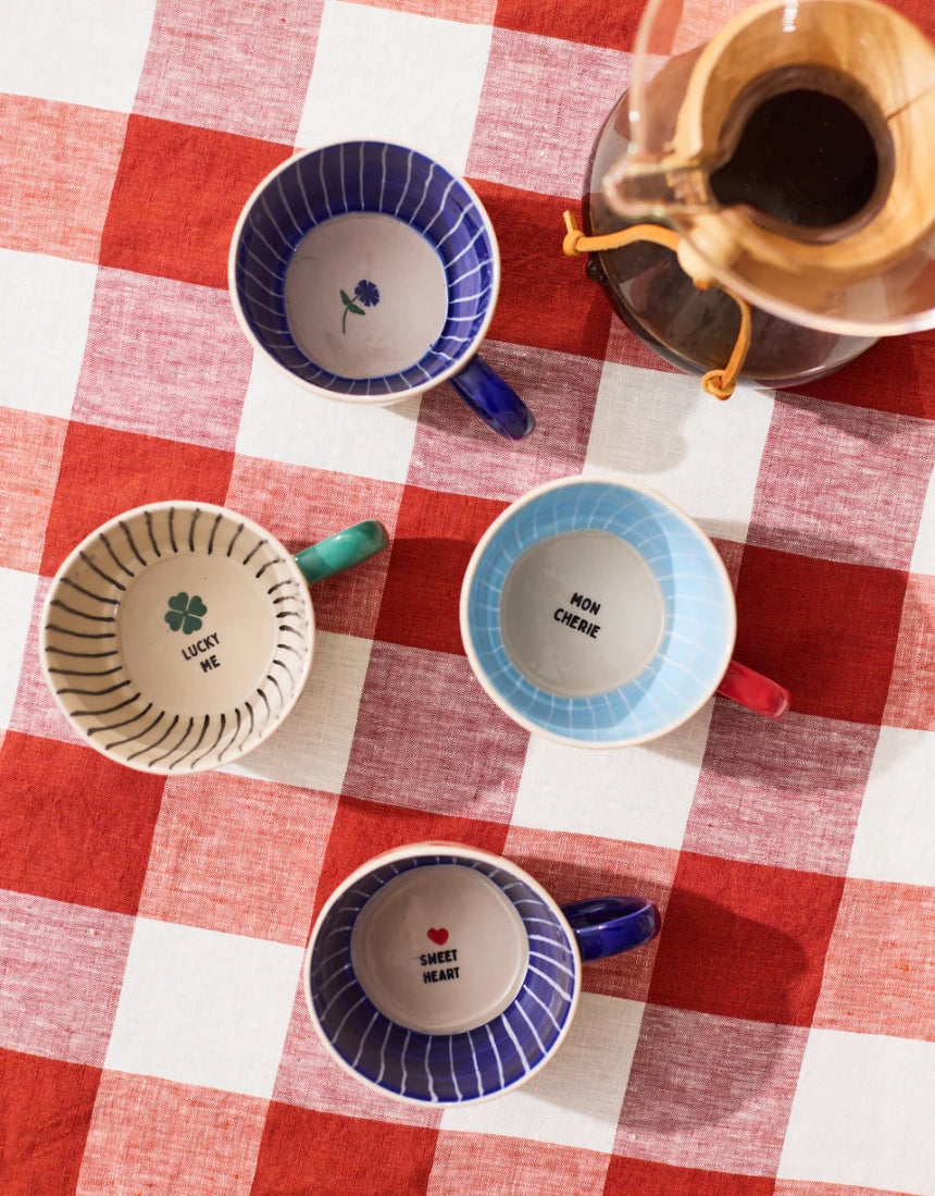 Jones & Co Chino Mug with Forget Me Knot design, featuring a ceramic mug with a floral pattern and stylish handle.