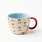 Jones & Co Chino Mug Mon Cherie featuring a stylish design and comfortable handle, perfect for everyday use.