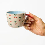 Jones & Co Chino Mug Mon Cherie featuring a stylish design, perfect for enjoying hot beverages in a modern ceramic mug.