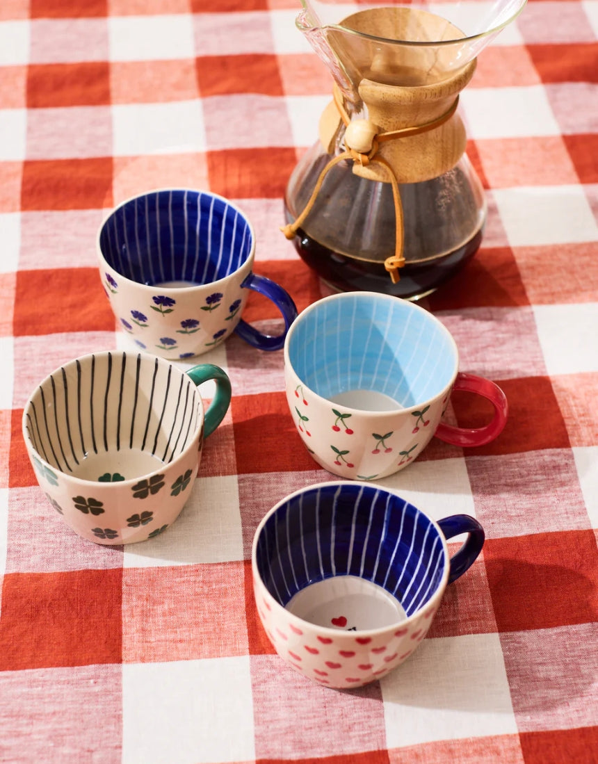 Jones & Co Chino Mug Mon Cherie featuring a stylish design, perfect for enjoying your favorite hot beverages.