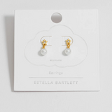 Estella Bartlett star and pearl stud earrings with gold-tone finish, featuring delicate star shapes and small pearl accents.