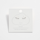 Estella Bartlett trio star stud earrings featuring three small star-shaped silver studs on a white background.