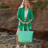 Base Cloud Take It Base in mint, featuring a soft, plush fabric with cloud patterns and a supportive, cushioned structure.