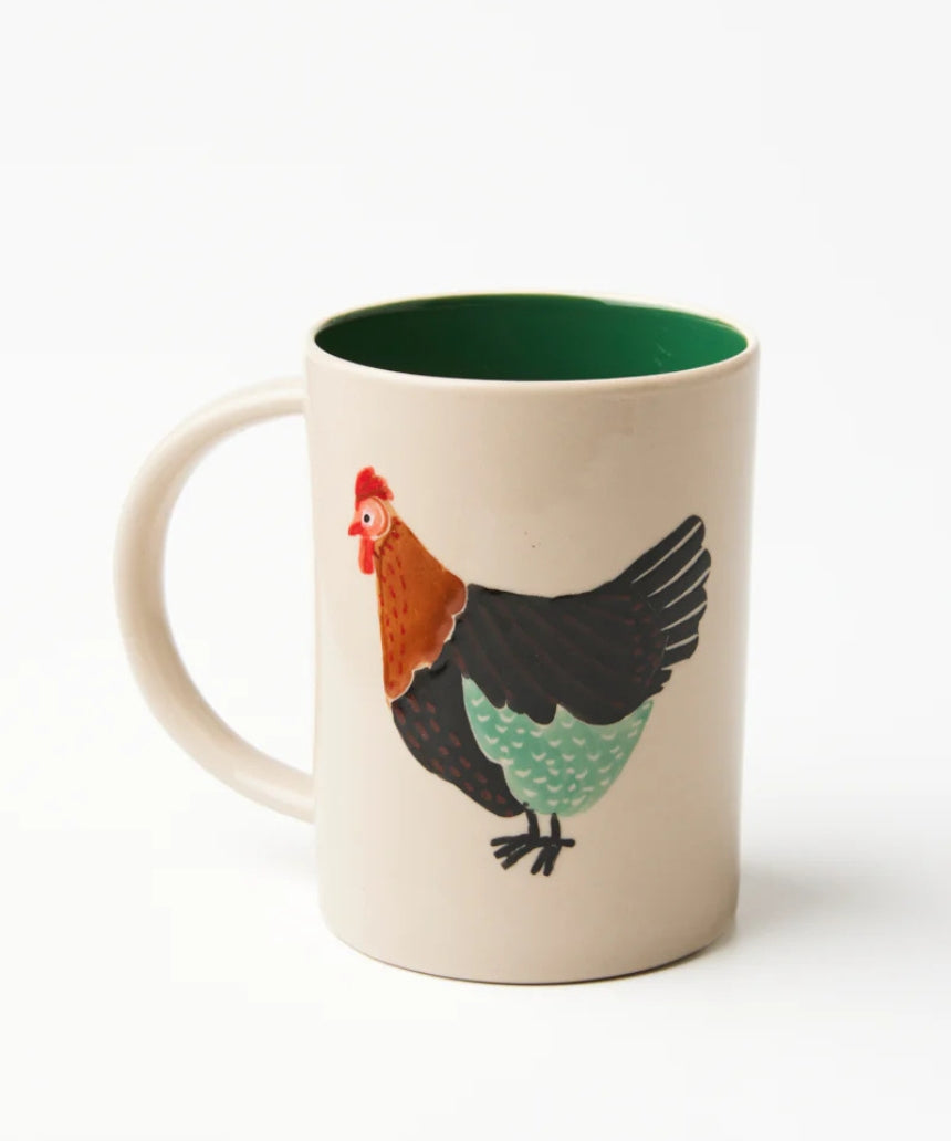Jones & Co Coop Clover Mug showing a ceramic mug with a green clover design on a white background.