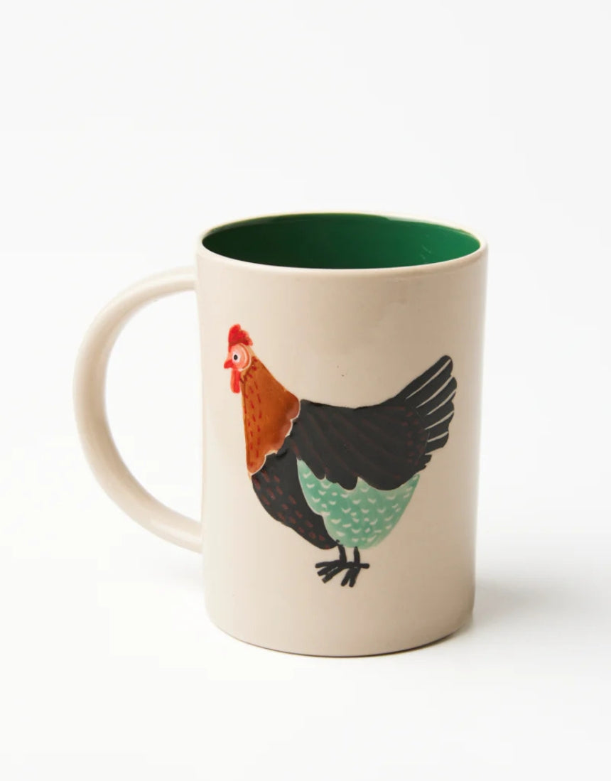 Jones & Co Coop Clover Mug showing a ceramic mug with a green clover design on a white background.