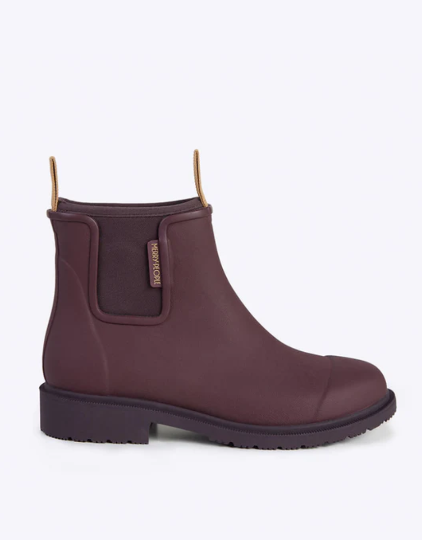 Dark cherry Merry People Bobbi gumboots on a white background, showcasing waterproof rubber footwear with textured soles.