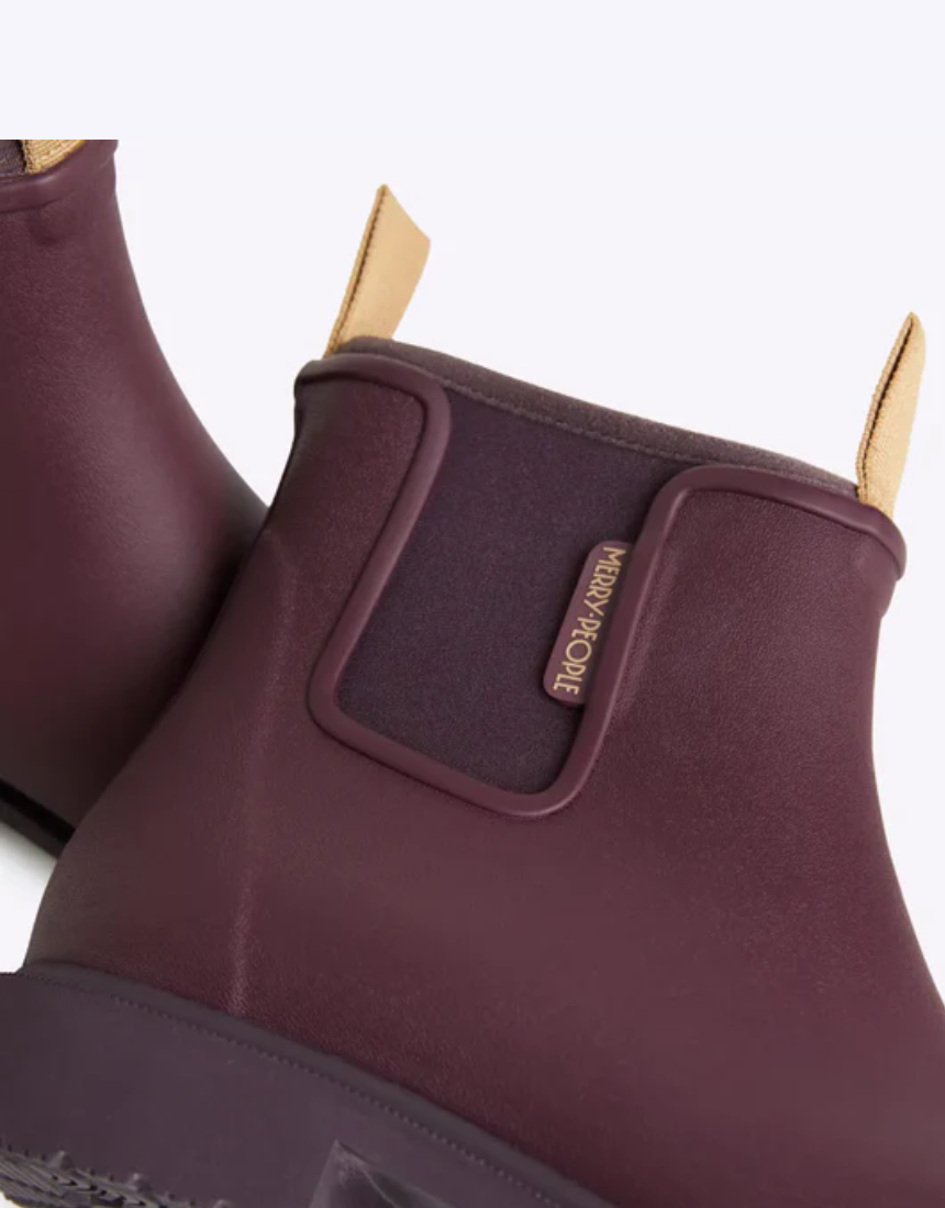 Merry People Bobbi gumboots in dark cherry color, waterproof rubber footwear with a playful, vibrant design.