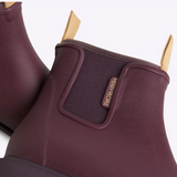 Merry People Bobbi gumboots in dark cherry color, waterproof rubber footwear with a playful, vibrant design.