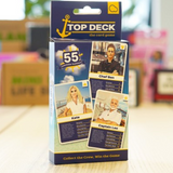 William Valentine Top Deck Card Game with colorful illustrated cards laid out on a table.