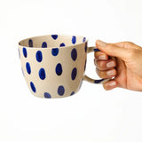 Jones & Co Chino Mug Boss Blue Spot with a stylish blue spotted design, perfect for daily use.