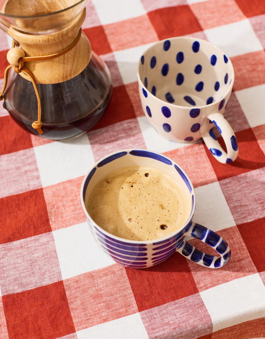 Jones & Co Chino Mug Boss Blue Spot featuring a stylish blue spotted design on a ceramic mug.